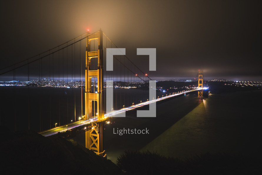 traffic on the Golden Gate bridge at night 