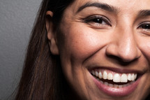 closeup of the face of a smiling woman