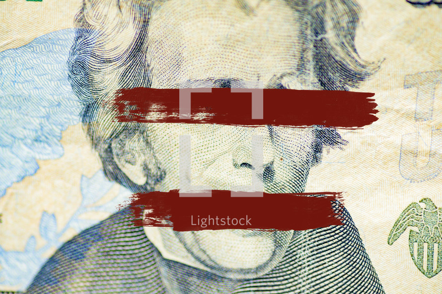 red lines on eyes and mouth of Andrew Jackson on US currency 