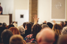 raised hands at Sunday Morning worship 