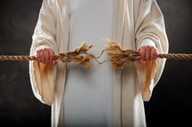 Jesus holding a frayed rope