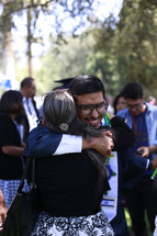 hugs after a graduation ceremony 