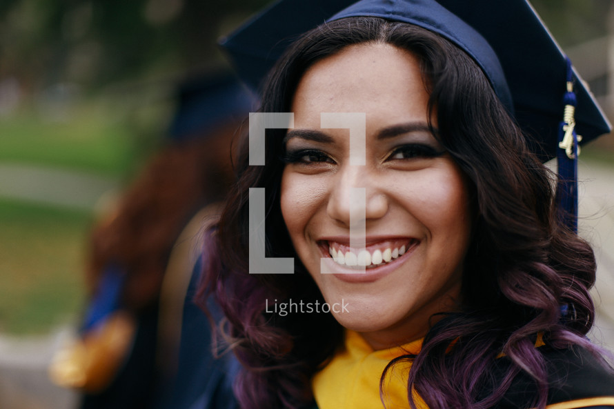 A smiling graduate 