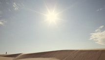 sunburst over a sand dune