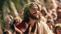 Jesus riding on a donkey through jerusalem on Palm Sunday