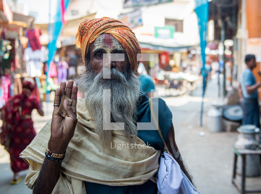 a man with face painted in India 