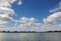 Low-lying clouds over a lake.