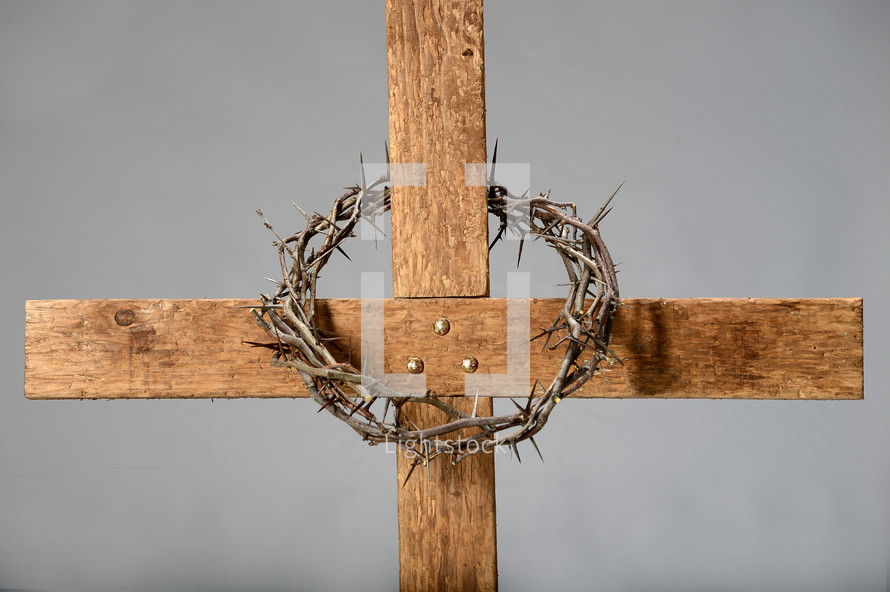 Crown of thorns on a wooden cross.