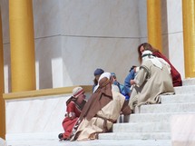 Jesus meeting with some of His followers ministering to them in front of one of the temple synagogues in Jerusalem. 