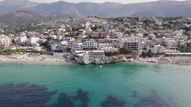 Aerial view of the Albanian Riviera at Himare, fly backwards