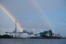 rainbow over a port 