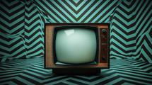 Hypnotic television with teal background. 