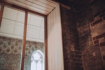 brick wall and window in a prayer room 