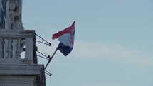 Croatian flag against a blue sky