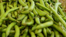 Fresh green beans at a farmer's market.