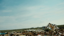 "An unidentified girl running with hair flying in the wind around the huge trash heap. 
This clip can use horror movie scene background."
