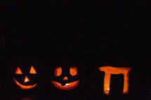 glowing carved pumpkins for Halloween 