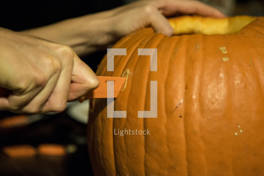carving pumpkins for Halloween 