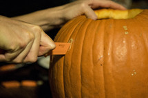 carving pumpkins for Halloween 
