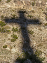 shadow of a cross on the ground 