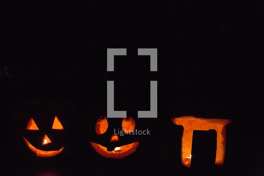 glowing carved pumpkins for Halloween 