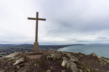 stone cross on a mountaintop 