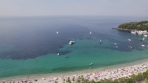 Crystal clear turquoise waters and multi-colored sandy beaches of Himare, Albania. Aerial view 