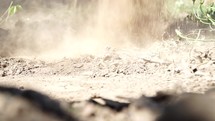Dirt being poured, filmed in 120fps modified to 23.976fps
