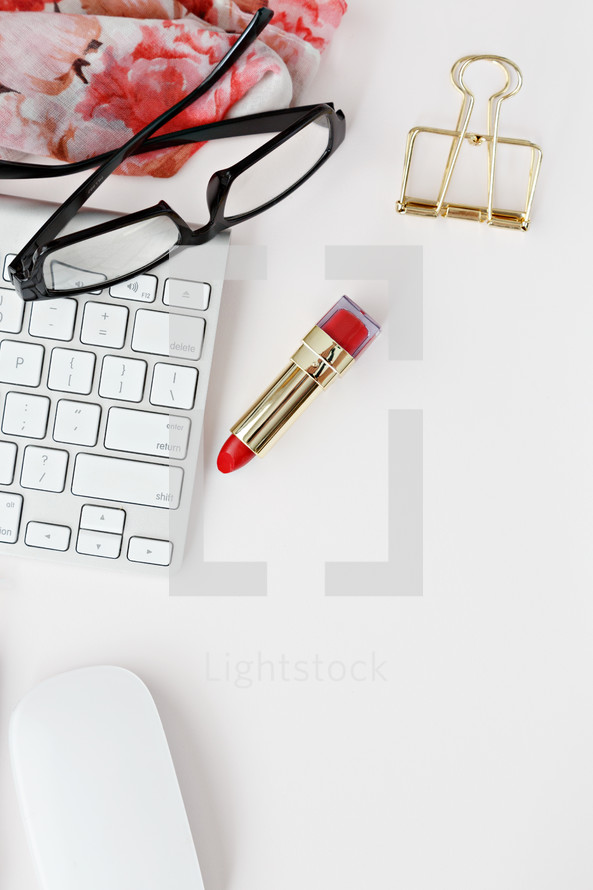 red lipstick, reading glasses, computer keyboard, desk, pen, floral scarf, feminine, female, desk