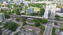 Aerial Orbit View of Train Station In Downtown City