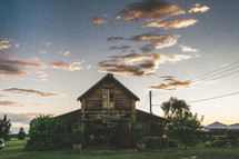 An old wooden building in the country.