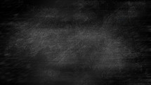 Black grunge chalkboard background texture 