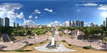 360 aerial photo taken with drone of statue atop column in Praça Republica in front of Teatro da Paz in Belém, Pará, Brazil