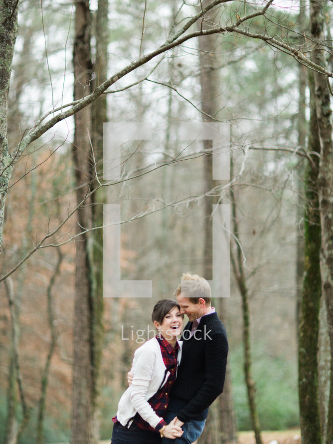 couple in love in the woods 