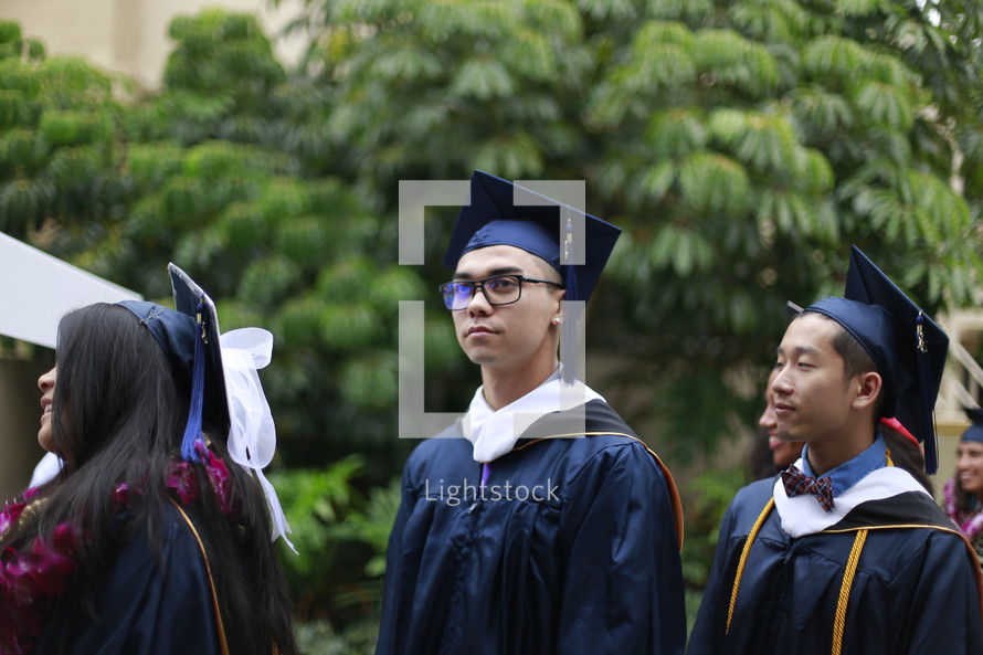graduates in caps and gowns