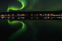 northern lights over water 