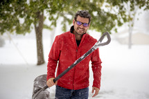 a man shoveling snow 