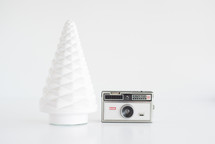 white Christmas tree and camera 