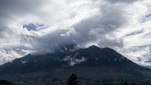 Timelapse of White Clouds Moving Over The Mountain Peak In Cayambe Coca Ecological Reserve In Napo, Ecuador.