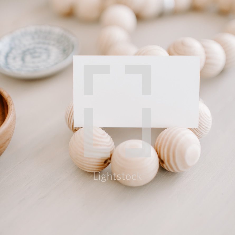 white card stock and wooden beads 