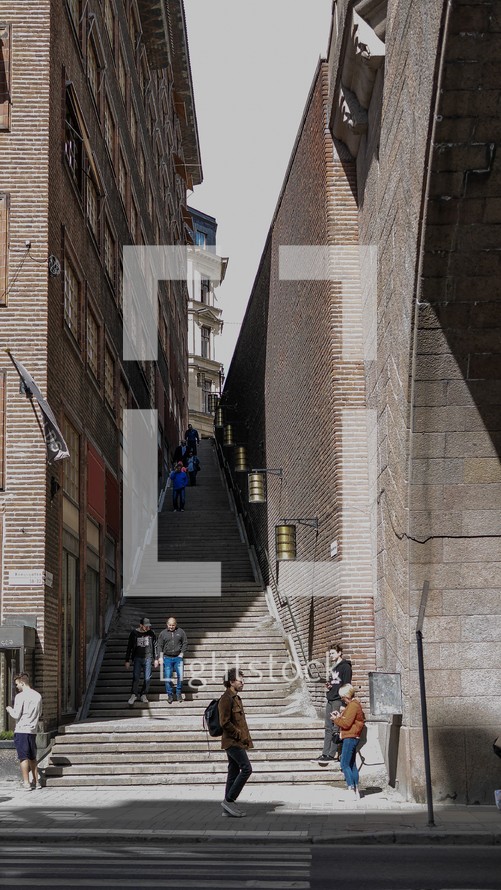 steps between buildings in a alley 
