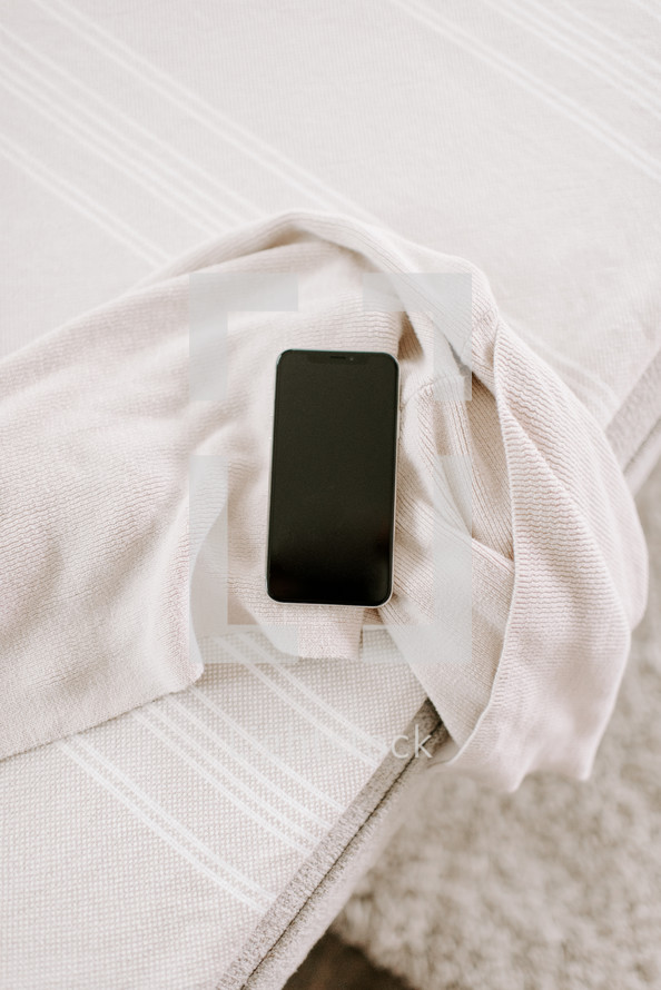 iPhone on a blanket 