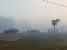 traffic on a foggy street 