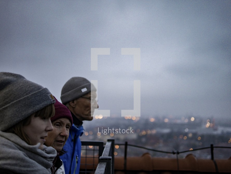 People looking out at a view of Gdansk, Poland 