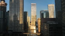 Bright Golden Sun Shining Through Buildings in London at Sunrise