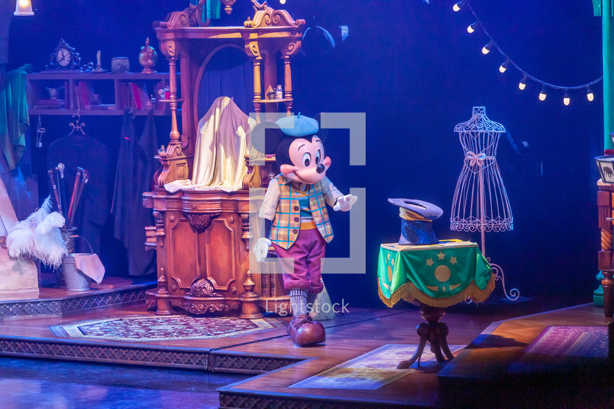 Paris, France - June 02, 2023: The Mickey and the Magician Show. As the magician's apprentice, Mickey learns the tricks of his trade from magical Disney Characters.