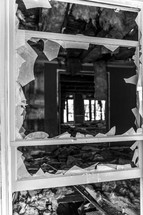 a broken window in an Abandoned house 