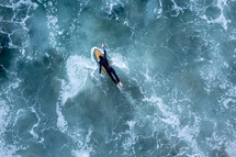 paddling surfer 