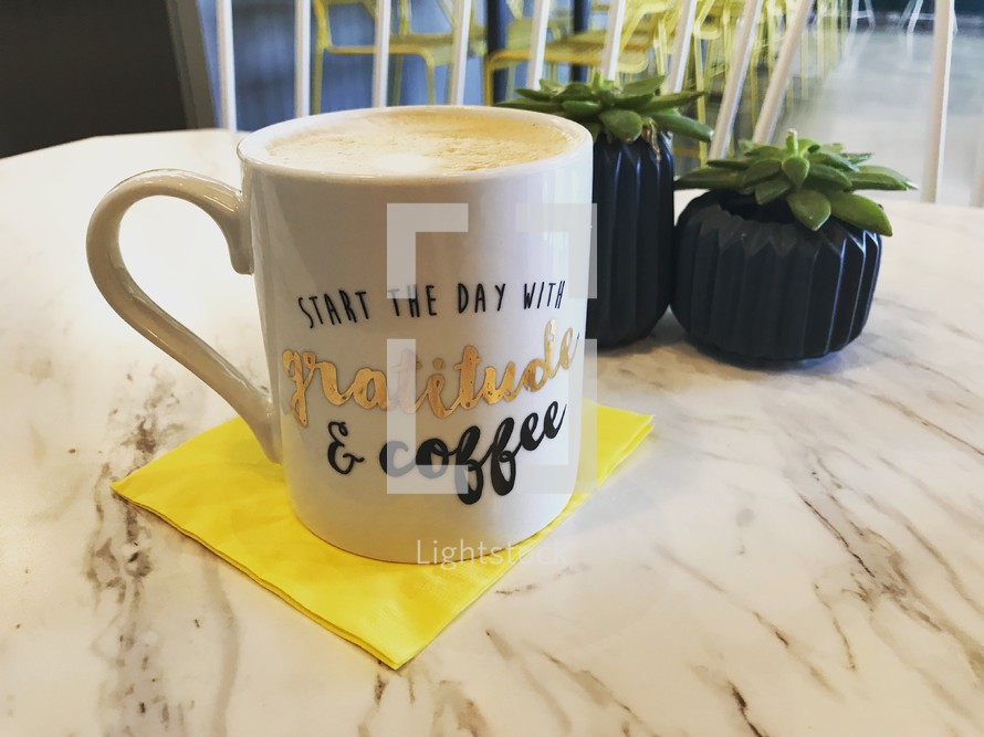 start the day with gratitude and coffee mug 