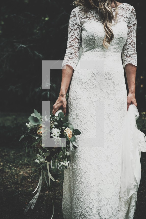 bride in a lace wedding gown 